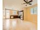 Spacious kitchen opens up into the living area featuring stainless steel appliances and granite counters at 130 Mountain Cedar Ct, North Las Vegas, NV 89031
