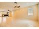Spacious living room boasts tile flooring, recessed lighting, and ceiling fans, creating a bright and airy atmosphere at 130 Mountain Cedar Ct, North Las Vegas, NV 89031