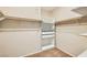 Well-organized walk-in closet with shelves, drawers, and rods for ample storage space at 130 Mountain Cedar Ct, North Las Vegas, NV 89031