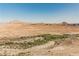 Expansive desert landscape features mountains, trees, and scenic views for a serene backdrop at 132 Soaring Sky Ave, Henderson, NV 89011