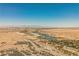 River winds through desert landscape with city views and clear blue skies at 132 Soaring Sky Ave, Henderson, NV 89011
