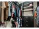 Custom walk-in closet with shelving and ample storage space for clothing and accessories at 132 Soaring Sky Ave, Henderson, NV 89011