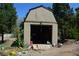 Spacious outdoor storage shed with open doors, providing ample space for tools and equipment at 1382 N Trout Canyon Rd, Las Vegas, NV 89124