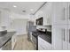 Well-lit kitchen showcasing stainless steel appliances, sleek countertops, and white cabinetry at 1405 Vegas Valley Dr # 312, Las Vegas, NV 89169