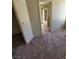 Bedroom with carpet flooring with a doorway leading to the bathroom at 149 Cologne Ct, Henderson, NV 89074