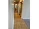 Hallway featuring neutral walls and tile flooring with access to bedroom and bathroom at 149 Cologne Ct, Henderson, NV 89074