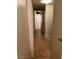 Hallway features tile flooring, neutral walls, and access to other rooms in the home at 149 Cologne Ct, Henderson, NV 89074