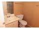 Cozy bathroom features vanity with sink, toilet, and towel bars, offering essential functionality at 1900 N Torrey Pines Dr # 225, Las Vegas, NV 89108