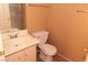 Cozy bathroom features vanity with sink, toilet, and towel bars, offering essential functionality at 1900 N Torrey Pines Dr # 225, Las Vegas, NV 89108