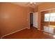 Wood floor bedroom featuring neutral paint, access to other rooms, closet, and ceiling fan at 1900 N Torrey Pines Dr # 225, Las Vegas, NV 89108