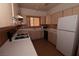 Well-lit kitchen features ample counter space, sleek appliances, and plentiful cabinet storage at 1900 N Torrey Pines Dr # 225, Las Vegas, NV 89108