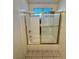 Standard bath featuring a tub with shower, and sliding glass door at 1906 Double Delight Ave, North Las Vegas, NV 89032