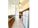 Efficient kitchen with granite countertops, white appliances, and abundant cabinet space at 1906 Double Delight Ave, North Las Vegas, NV 89032