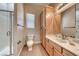 Bathroom featuring a vanity with a sink, a toilet, a shower, and tile floors at 2064 Poetry Ave, Henderson, NV 89052