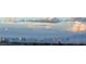The Las Vegas skyline is seen beyond the community, providing a panoramic backdrop at 2064 Poetry Ave, Henderson, NV 89052