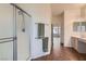 Modern bathroom with a glass-enclosed shower and views to the hall and bathroom at 225 Deer Crossing Way, Henderson, NV 89012