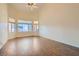 Spacious bedroom with wood floors, large windows, and ample natural light at 225 Deer Crossing Way, Henderson, NV 89012