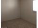 Cozy bedroom with neutral carpet and plenty of natural light at 2290 Desert Inn, Las Vegas, NV 89169