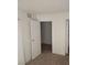 Spacious bedroom with an open doorway and modern lighting at 2290 Desert Inn, Las Vegas, NV 89169