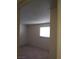Cozy bedroom with neutral carpet and a window with natural light at 2290 Desert Inn, Las Vegas, NV 89169