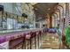 The building has a luxurious bar area with plush purple seating and a large selection of spirits at 2600 W Harmon Ave # 25019, Las Vegas, NV 89158