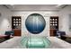 A spa features a plunge pool, tiled walls, and amenities for a relaxing and luxurious experience at 2600 W Harmon Ave # 25019, Las Vegas, NV 89158