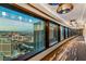 The corridor view showcases the city skyline and the building's upscale interior design at 2600 W Harmon Ave # 25019, Las Vegas, NV 89158