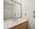 Bathroom features a large mirror, vanity with marble countertop, and neutral color scheme at 2632 Starfish Ct, Las Vegas, NV 89128