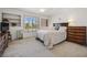 Bedroom boasts built-in shelves, a ceiling fan, and plantation shutters for added privacy at 2632 Starfish Ct, Las Vegas, NV 89128