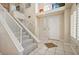 Entryway featuring tile flooring, stairs, and bright natural light at 2632 Starfish Ct, Las Vegas, NV 89128