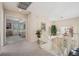 Bright hallway with stairs and view to a bedroom showcases neutral color palette and natural light at 2632 Starfish Ct, Las Vegas, NV 89128