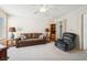 Living room is equipped with comfortable seating, neutral carpets and bright walls at 2632 Starfish Ct, Las Vegas, NV 89128