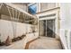 An inviting patio area with sliding glass doors, offering a seamless transition to the indoors at 2632 Starfish Ct, Las Vegas, NV 89128