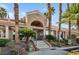 Exterior shot of the Racquet Club with lush landscaping and easy access to community amenities at 2632 Starfish Ct, Las Vegas, NV 89128