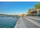 Scenic waterfront with boats, docks, and lakeside dining offering a vibrant community atmosphere at 27 Parco Fiore Ct, Henderson, NV 89011