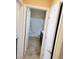 View of a bathroom with a tub, toilet, and vanity, accessible through open doors at 2748 Brinkley Manor St, Laughlin, NV 89029