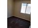 Neutral bedroom offers comfortable carpeting, a new paint job and excellent lighting at 2748 Brinkley Manor St, Laughlin, NV 89029