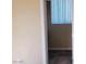 Bedroom with a window, neutral walls, and door opening leading into the room at 2748 Brinkley Manor St, Laughlin, NV 89029