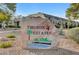 Signage at Tiburon Estates surrounded by desert landscaping, marking the entrance to the community at 3261 Ennis Ct, Las Vegas, NV 89121