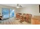Elegant dining room with hardwood floors and sliding door access to patio at 3261 Ennis Ct, Las Vegas, NV 89121