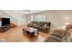 Comfortable living room boasting hardwood floors and lots of seating at 3261 Ennis Ct, Las Vegas, NV 89121