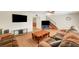 Well-lit living room showcases hardwood floors, ceiling fan and modern furnishings at 3261 Ennis Ct, Las Vegas, NV 89121