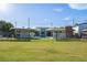 Expansive backyard featuring a sparkling pool and well-maintained lawn, perfect for outdoor enjoyment at 3586 Spencer St, Las Vegas, NV 89169