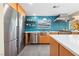 Bright kitchen featuring stainless steel appliances, stylish backsplash, and a modern stainless steel sink at 3586 Spencer St, Las Vegas, NV 89169