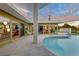 Outdoor pool at dusk with access to interior and a golf course view at 3586 Spencer St, Las Vegas, NV 89169