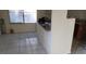 Eat-in kitchen featuring tile floors and light granite countertops at 3711 Southern Light Dr, Las Vegas, NV 89115