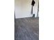 Open living room space featuring wood-look flooring and neutral paint at 3711 Southern Light Dr, Las Vegas, NV 89115