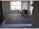 View of open-plan living room space with wood-look flooring and natural light at 3711 Southern Light Dr, Las Vegas, NV 89115