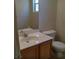 Well-kept half bathroom with vanity, mirror, and toilet at 3883 Winter Whitetail St, Las Vegas, NV 89122