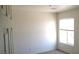 Bright bedroom with neutral walls, carpeted floors and natural light from the window at 3883 Winter Whitetail St, Las Vegas, NV 89122